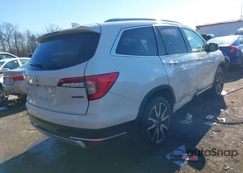 2019 Honda Pilot Touring z USA, uszkodzony, nr VIN 5FNYF5H66KB017476